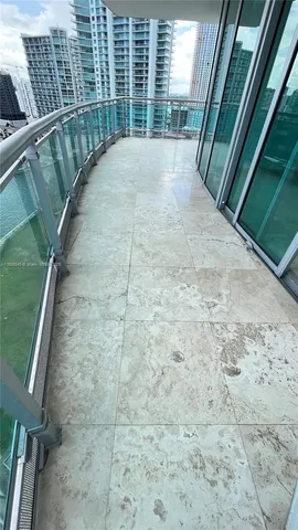 a view of empty room with floor to ceiling window