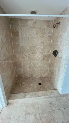 a view of a swimming pool with outdoor seating