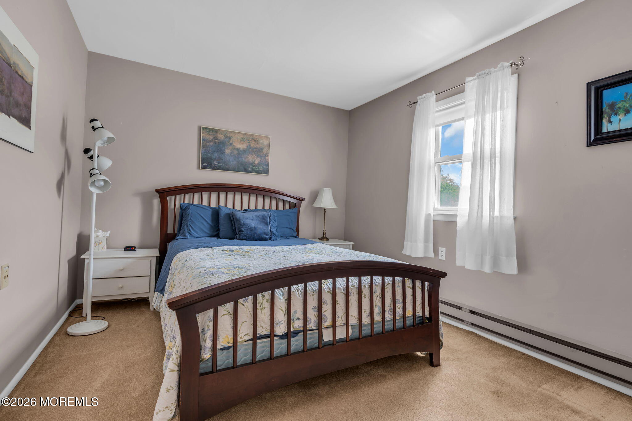 67 Blake Circle Brick, NJ 08724 - Photo 27 of 34 a bedroom with a bed and window