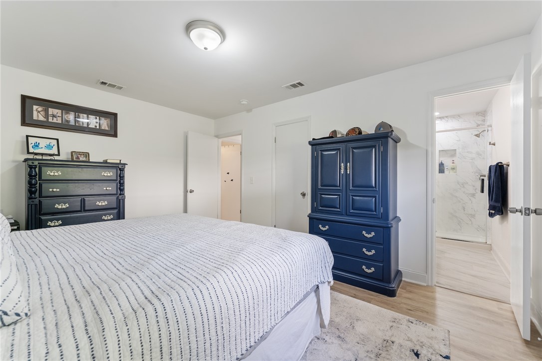 1007 Brown Road Anderson, SC 29621 - Photo 16 of 27 This spacious bedroom offers a tranquil retreat, complete with ample storage and an adjoining bath.