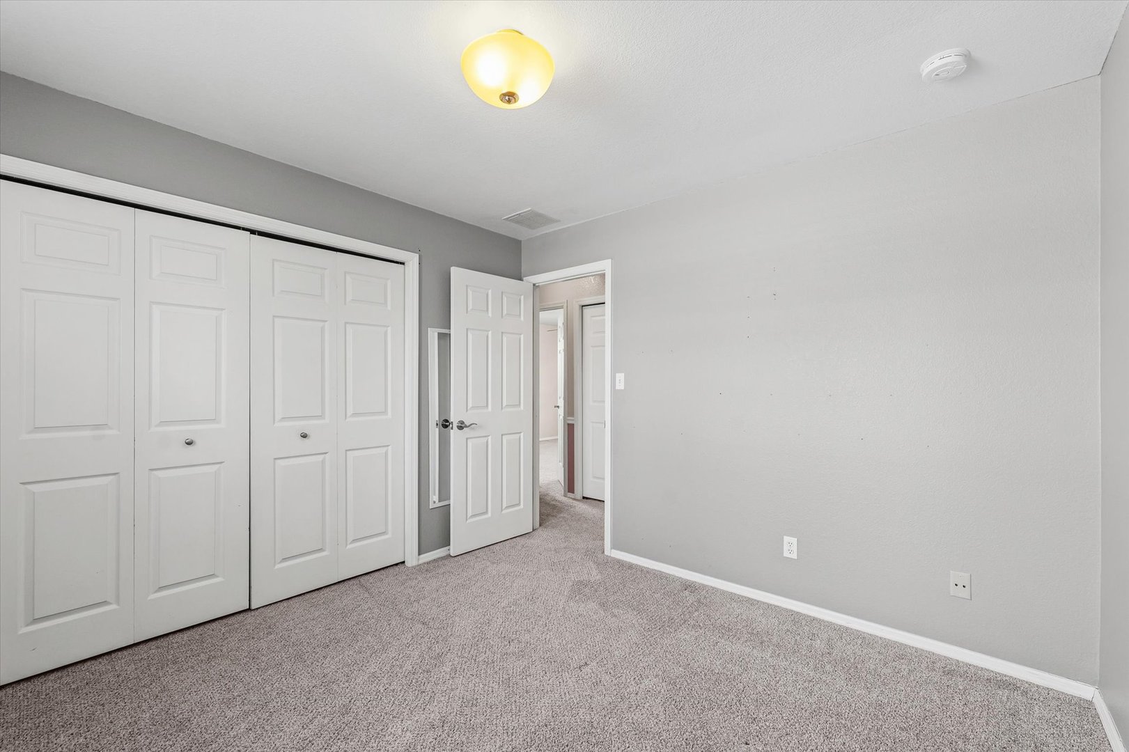 606 Cedar Drive St. Joseph, IL 61873 - Photo 18 of 32 an empty room with windows