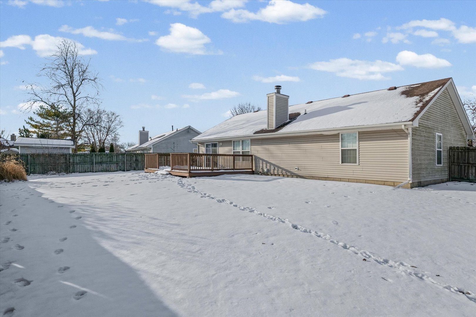 606 Cedar Drive St. Joseph, IL 61873 - Photo 30 of 32 a view of a house with a backyard