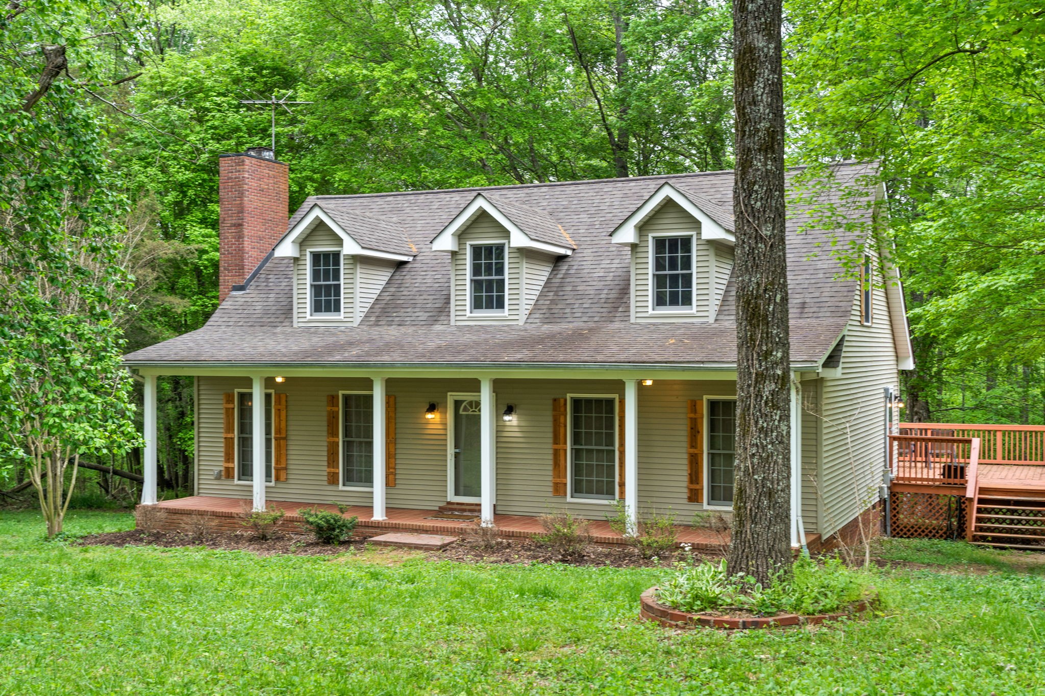 1925 7 Mile Ferry Road Clarksville, TN 37040 - Photo 1 of 57 a front view of a house with a yard and porch