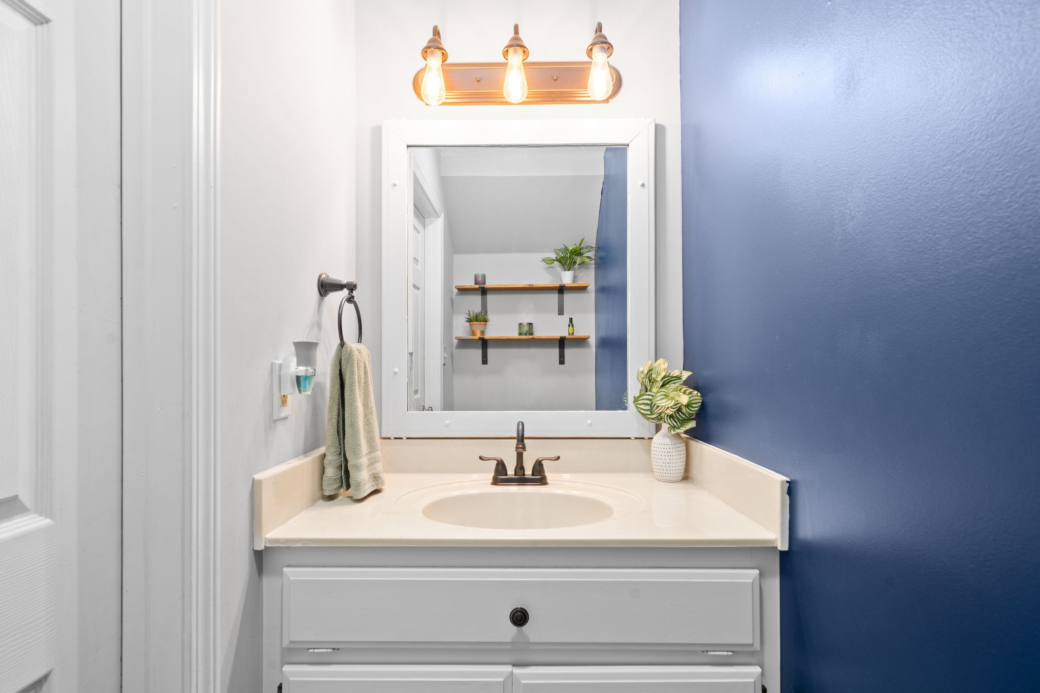 1925 7 Mile Ferry Road Clarksville, TN 37040 - Photo 24 of 57 a bathroom with a sink and a mirror