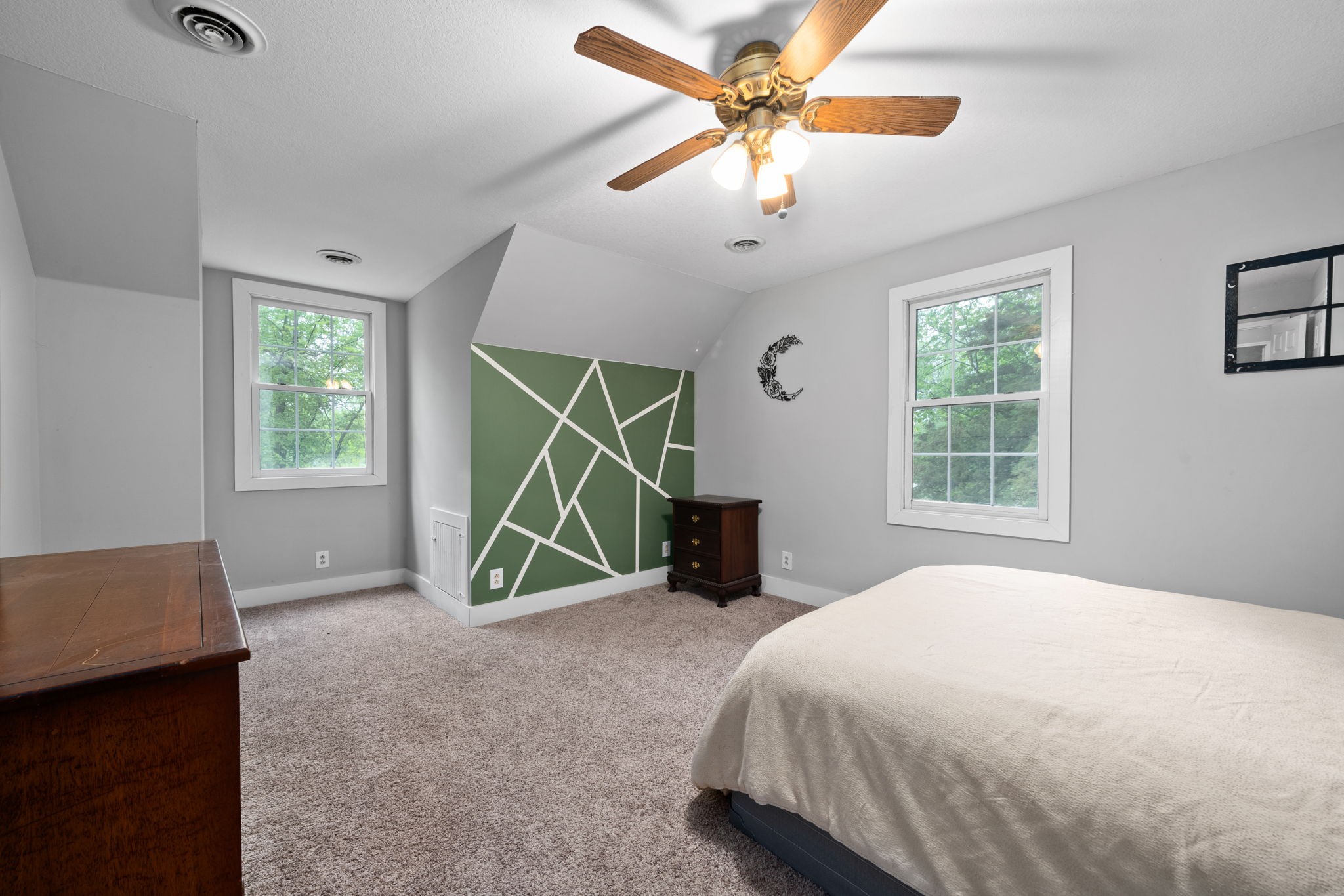 1925 7 Mile Ferry Road Clarksville, TN 37040 - Photo 35 of 57 a bedroom with a bed and a chandelier