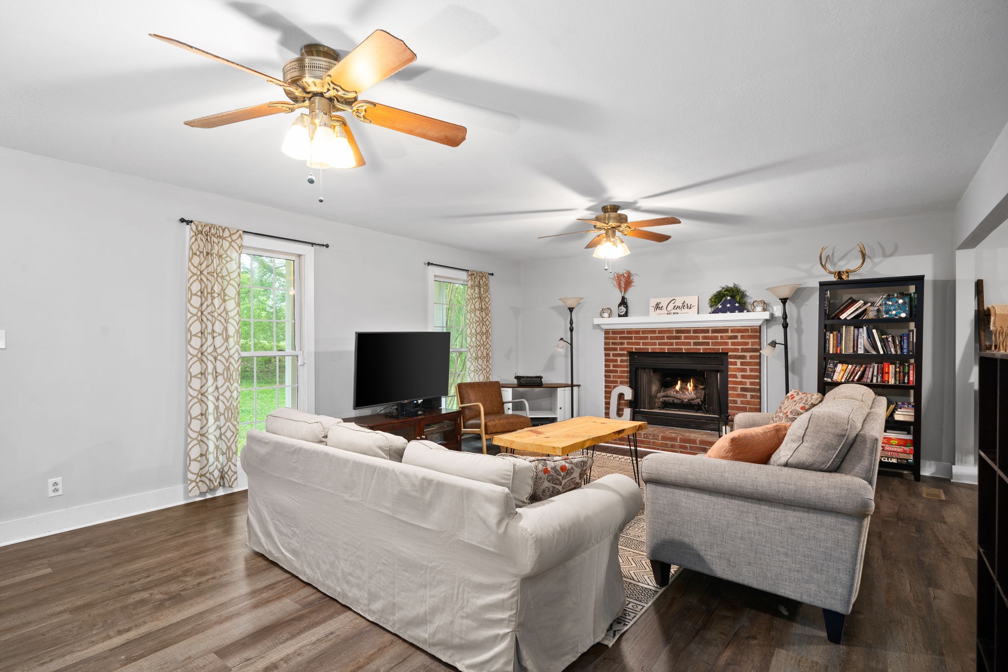 1925 7 Mile Ferry Road Clarksville, TN 37040 - Photo 10 of 57 a living room with furniture and a fireplace