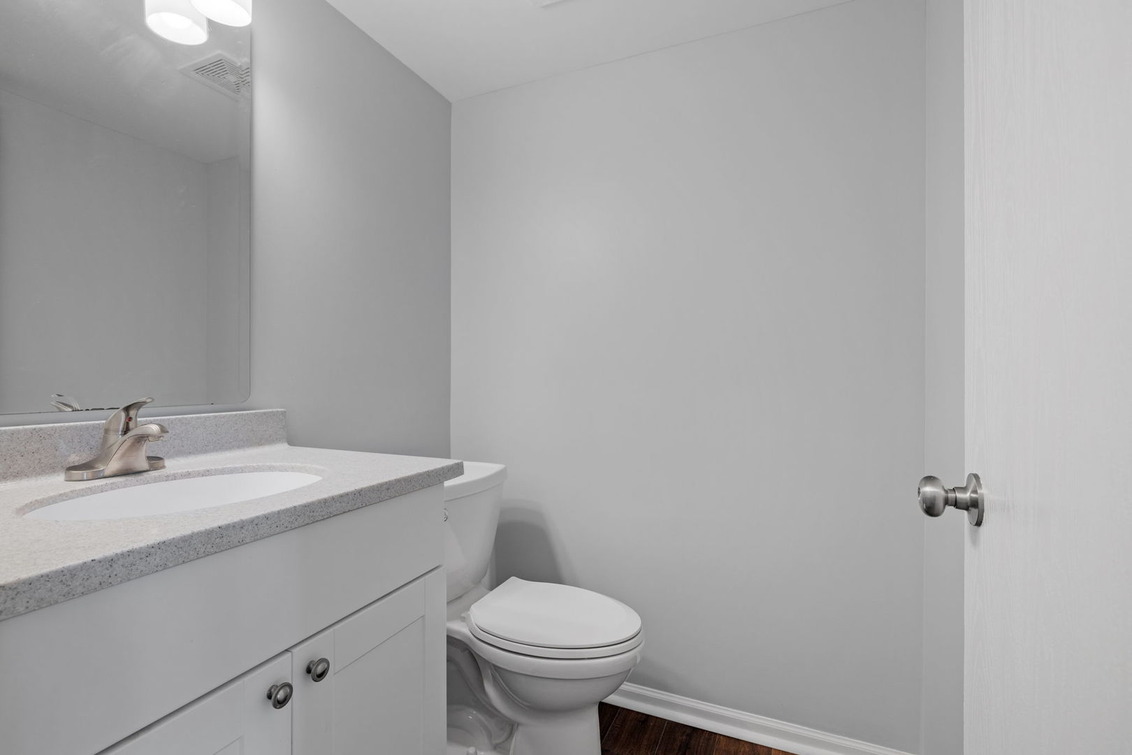 25172 Faraday Road, Unit 1 Manhattan, IL 60442 - Photo 14 of 25 a bathroom with a granite countertop toilet and a sink