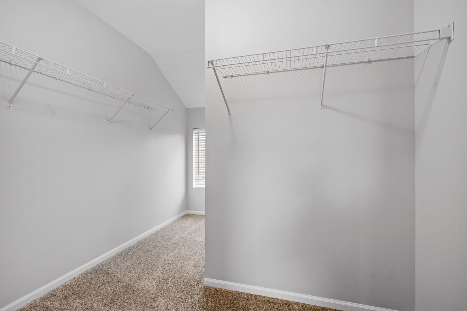 25172 Faraday Road, Unit 1 Manhattan, IL 60442 - Photo 16 of 25 a view of a room with racks on the wall