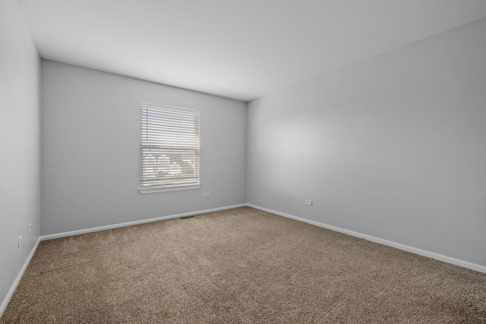 25172 Faraday Road, Unit 1 Manhattan, IL 60442 - Photo 17 of 25 an empty room with a window