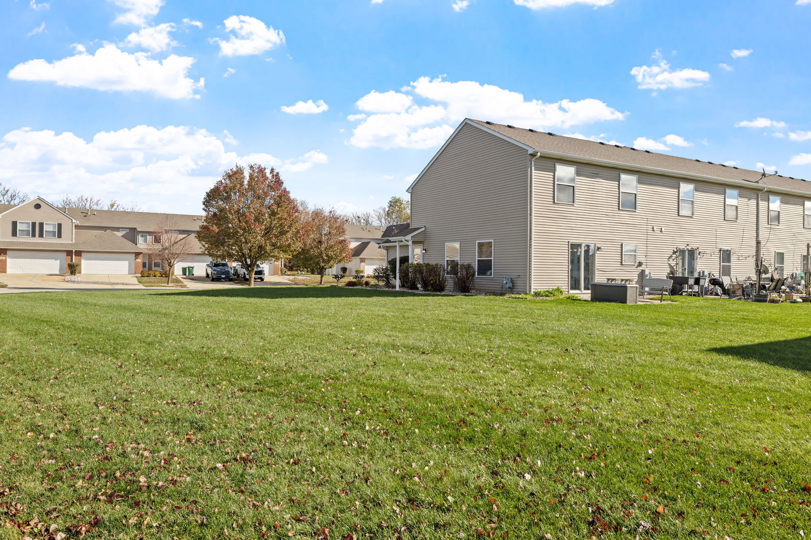 25172 Faraday Road, Unit 1 Manhattan, IL 60442 - Photo 21 of 25 a view of yard with swimming pool and green space
