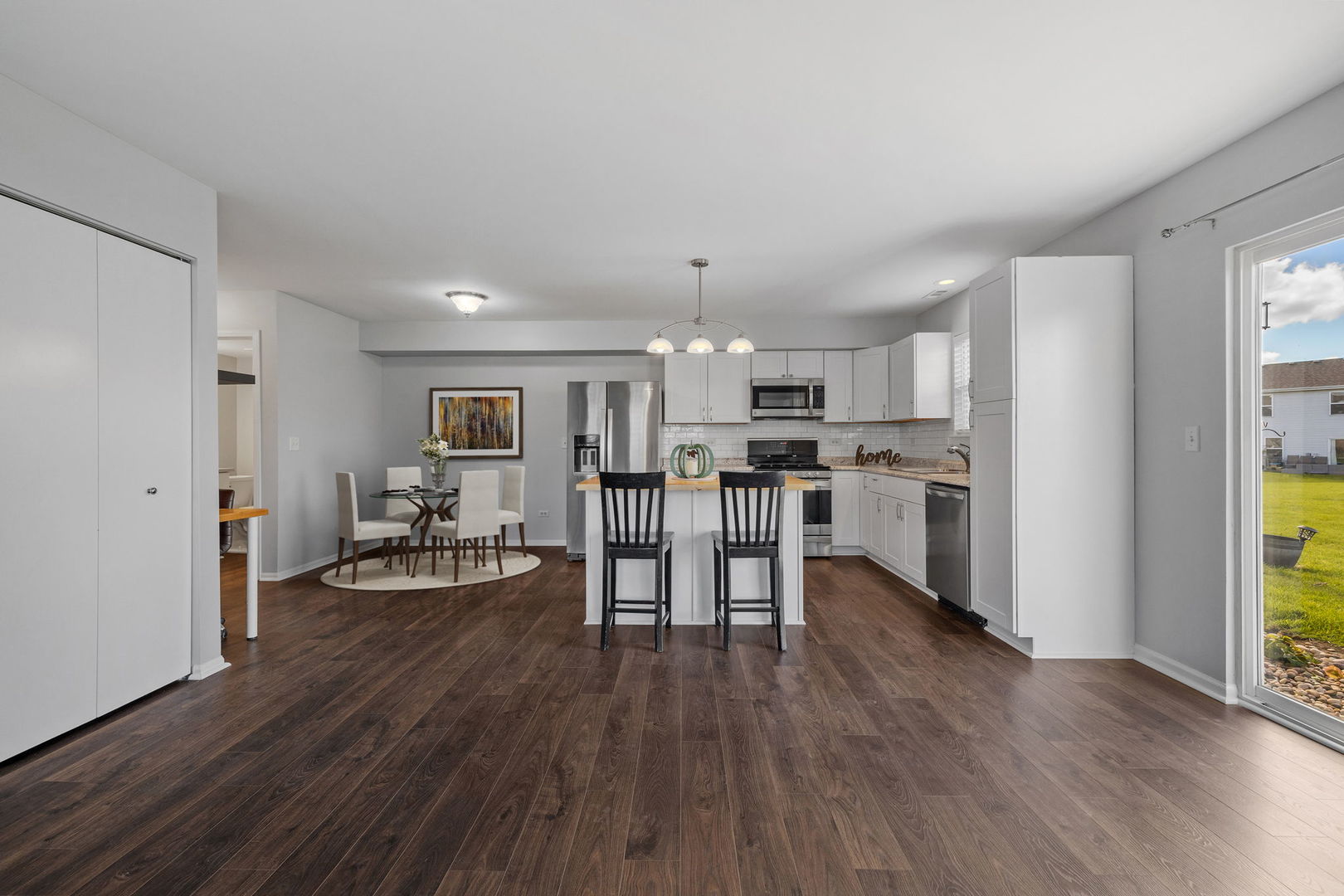 25172 Faraday Road, Unit 1 Manhattan, IL 60442 - Photo 7 of 25 a view of a kitchen and dining room
