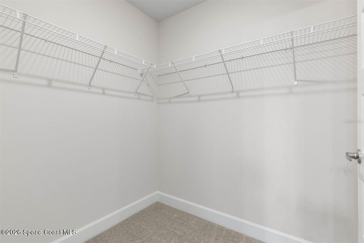 962 Seneca Avenue Sebastian, FL 32958 - Photo 17 of 28 a view of a room with racks on the wall