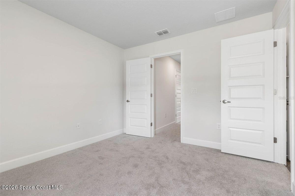 962 Seneca Avenue Sebastian, FL 32958 - Photo 20 of 28 an empty room with closet area