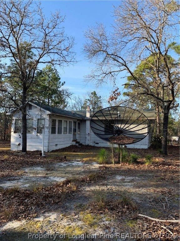 1231 Loop Road Raeford, NC 28376 - Photo 11 of 11 a view of a house with a yard