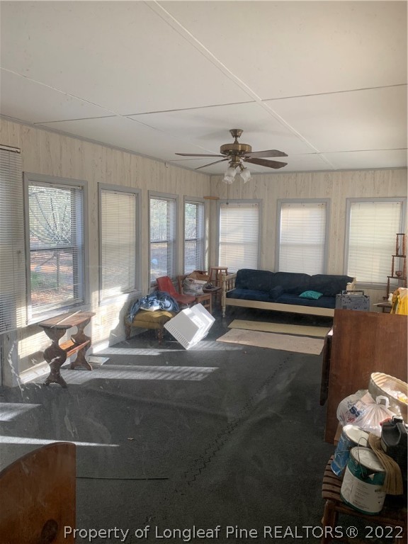 1231 Loop Road Raeford, NC 28376 - Photo 7 of 11 a living room with furniture and a large window