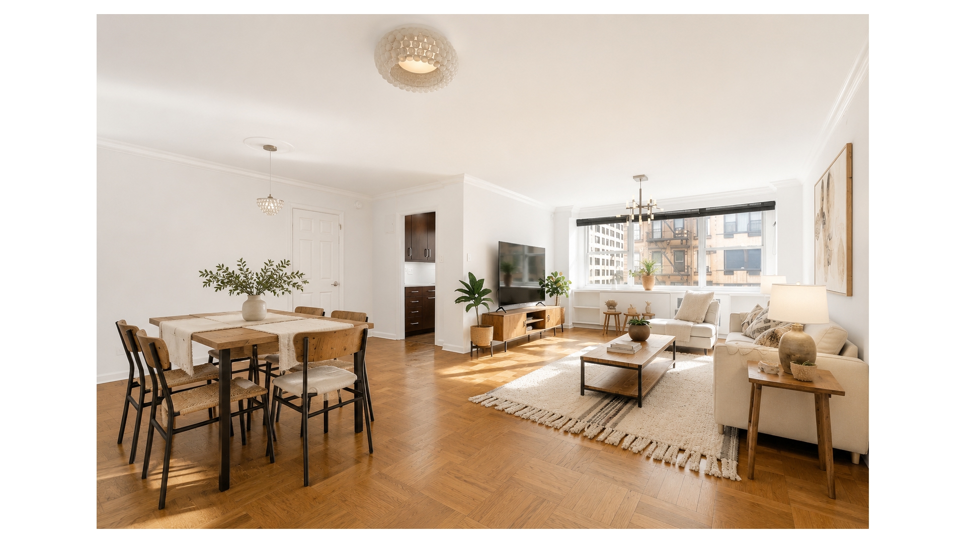 233 East 69th Street, Unit 3L Manhattan, NY 10021 - Photo 1 of 9 a living room with furniture and a large window