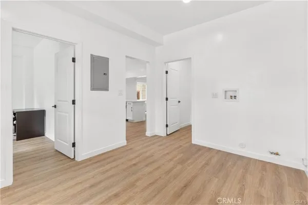 a view of a livingroom with wooden floor