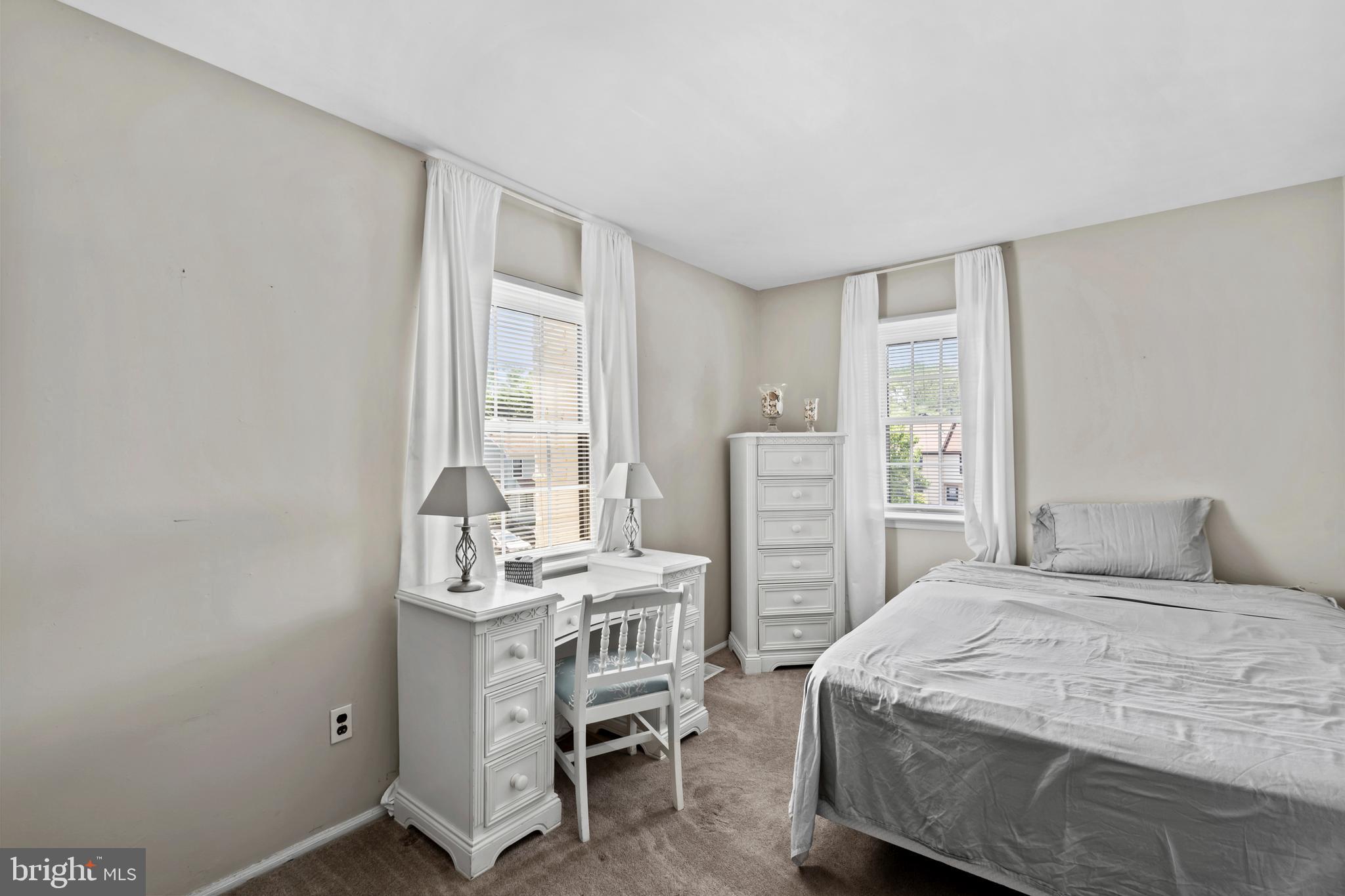 110 Rutledge Court North Wales, PA 19454 - Photo 18 of 35 a bedroom with a bed and a table in it