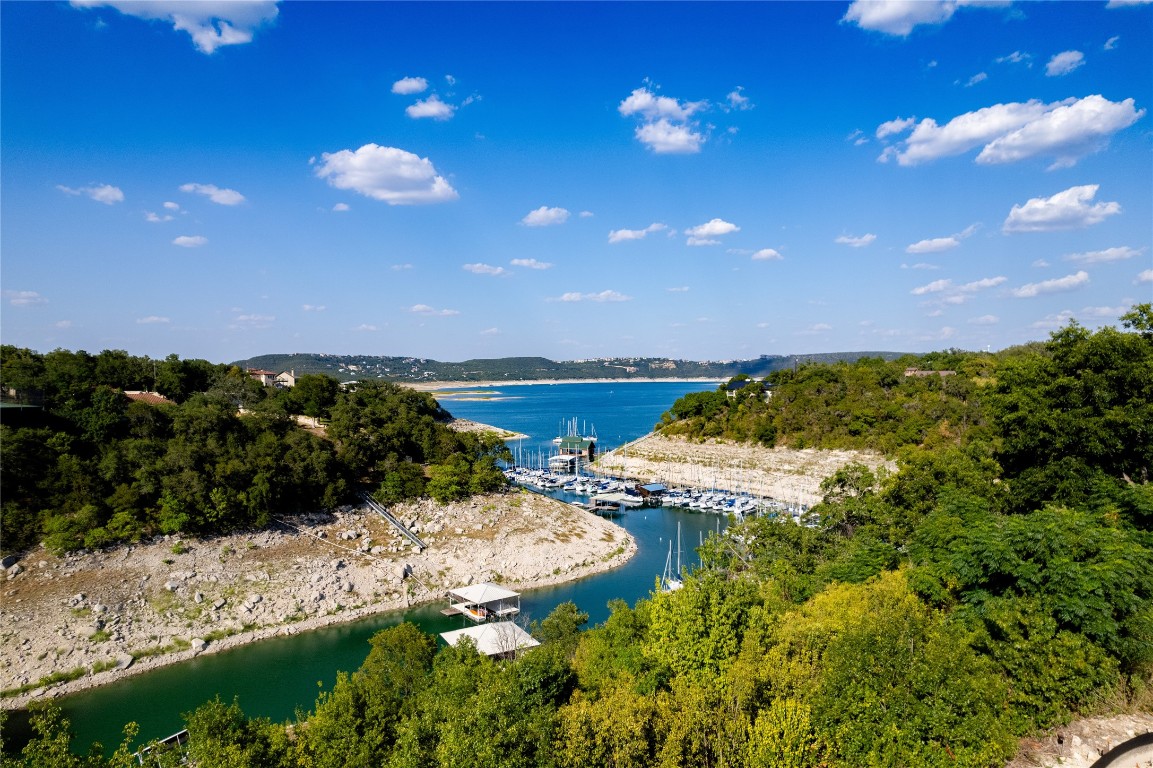 14610 Agarita Road Austin, TX 78734 - Photo 28 of 35 a view of a water pond with lots of green space