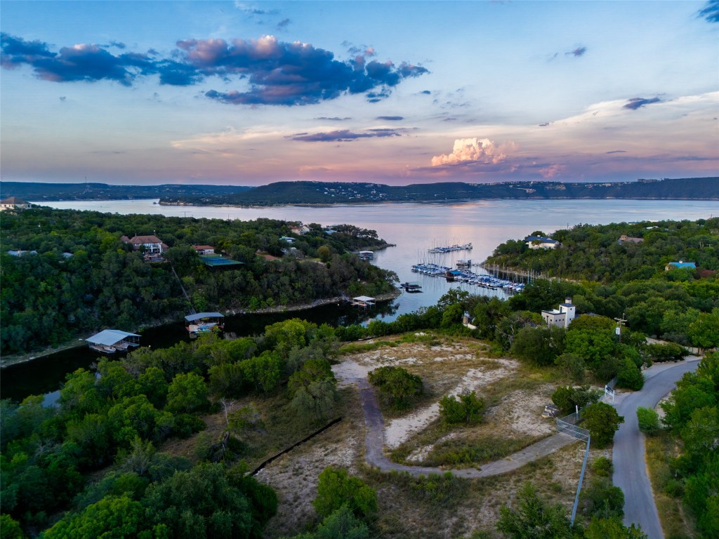14610 Agarita Road Austin, TX 78734 - Photo 35 of 35 a view of a lake with sunset in background