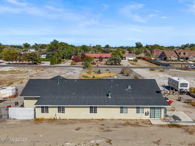 an aerial view of a house with a outdoor space