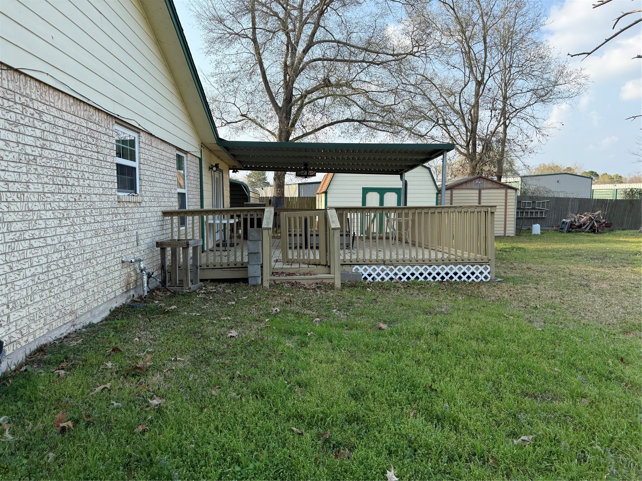 51 Oak Ridge Point Blank, TX 77364 - Photo 21 of 29 Right side of house with deck.