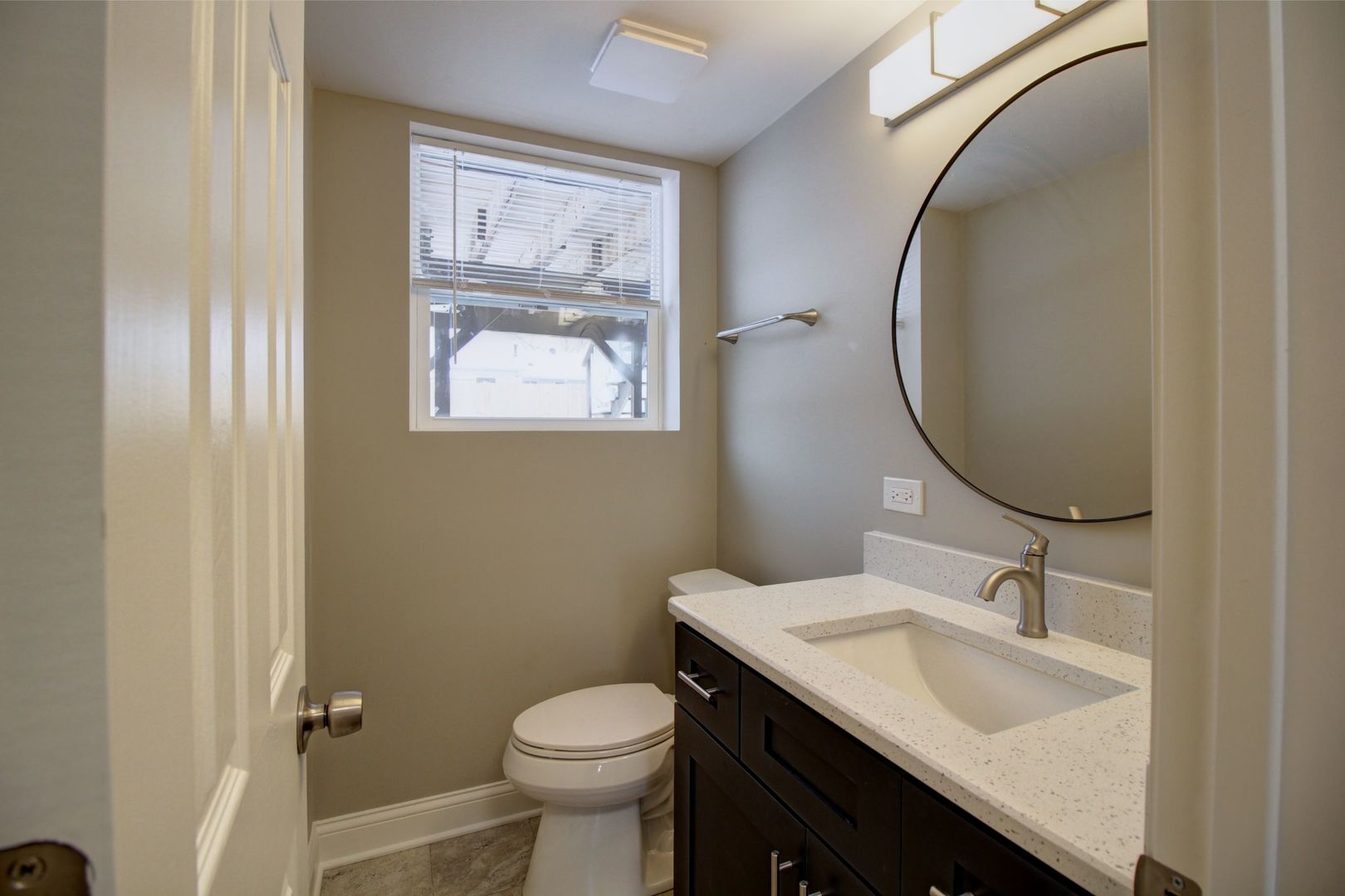 225 Haller Avenue Romeoville, IL 60446 - Photo 14 of 19 a bathroom with a sink and a mirror