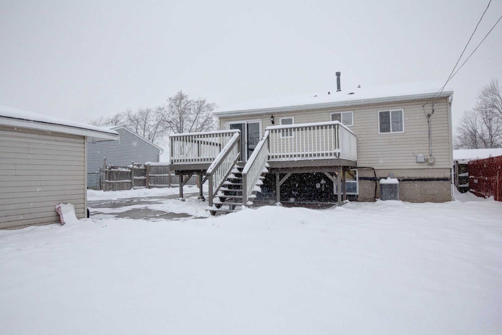 225 Haller Avenue Romeoville, IL 60446 - Photo 17 of 19 an empty room with furniture and kitchen view