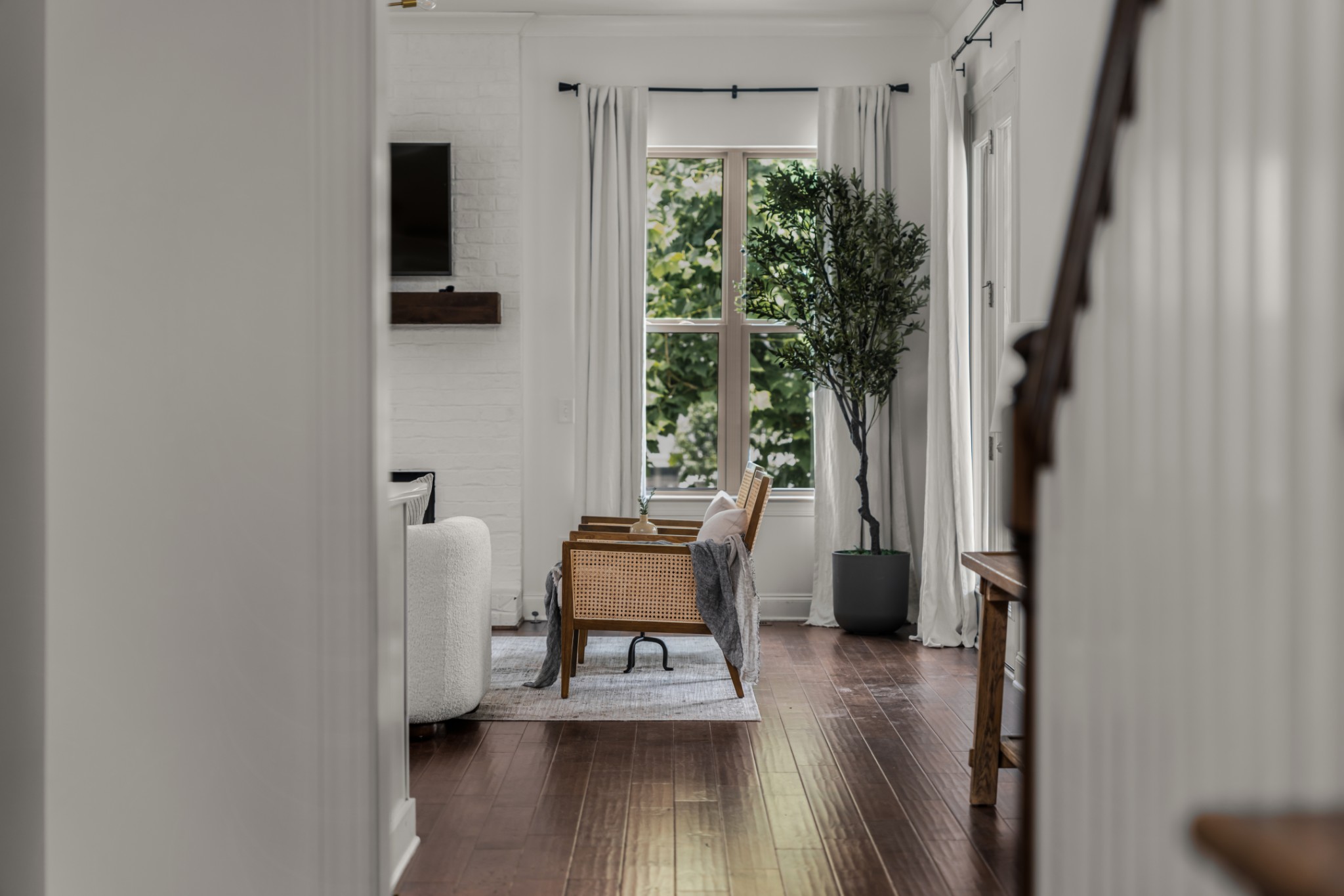 449 River Bluff Drive Franklin, TN 37064 - Photo 12 of 51 a view of a room with a chair and wooden floor