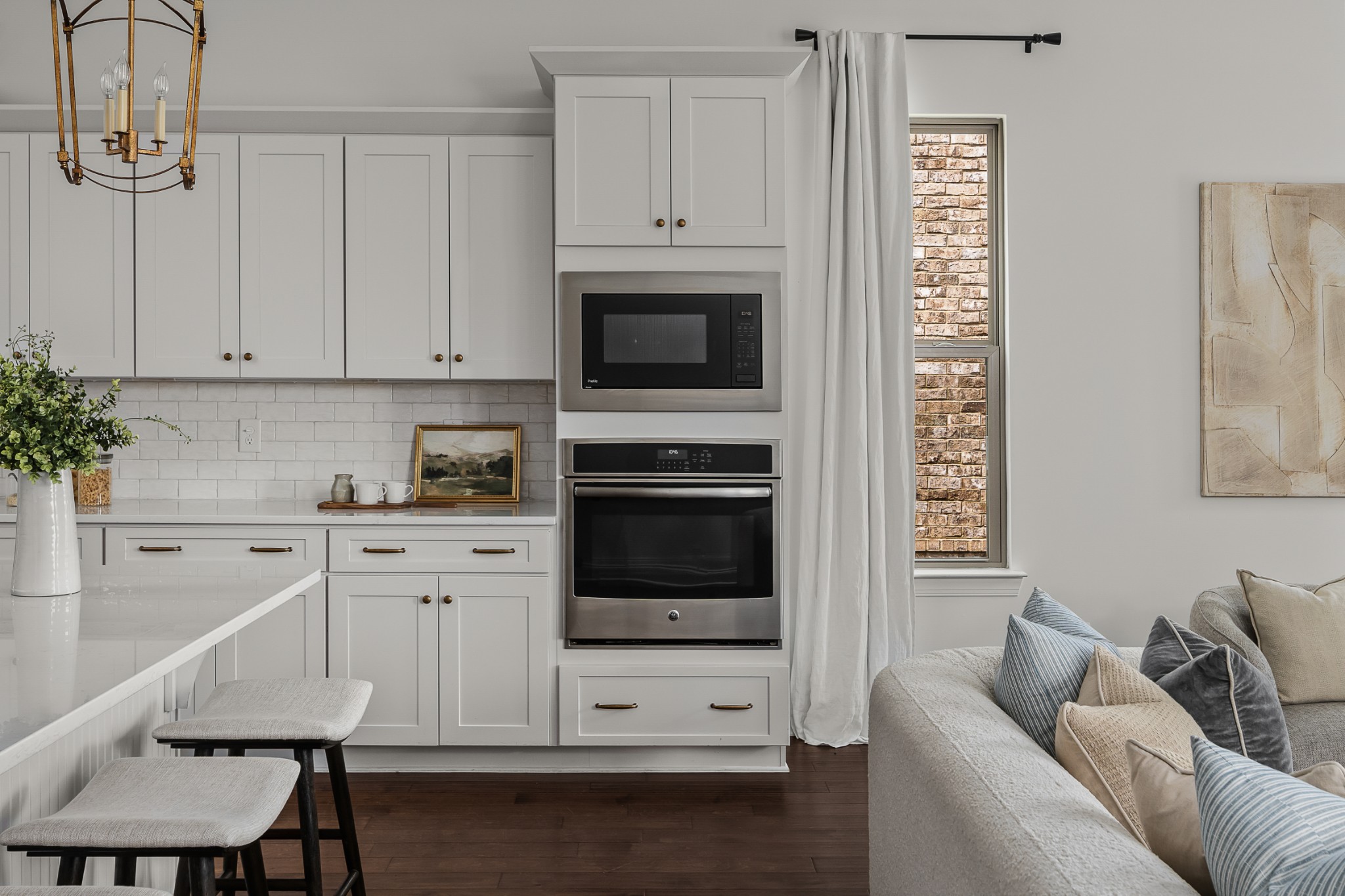 449 River Bluff Drive Franklin, TN 37064 - Photo 20 of 51 a kitchen with granite countertop a stove and white cabinets