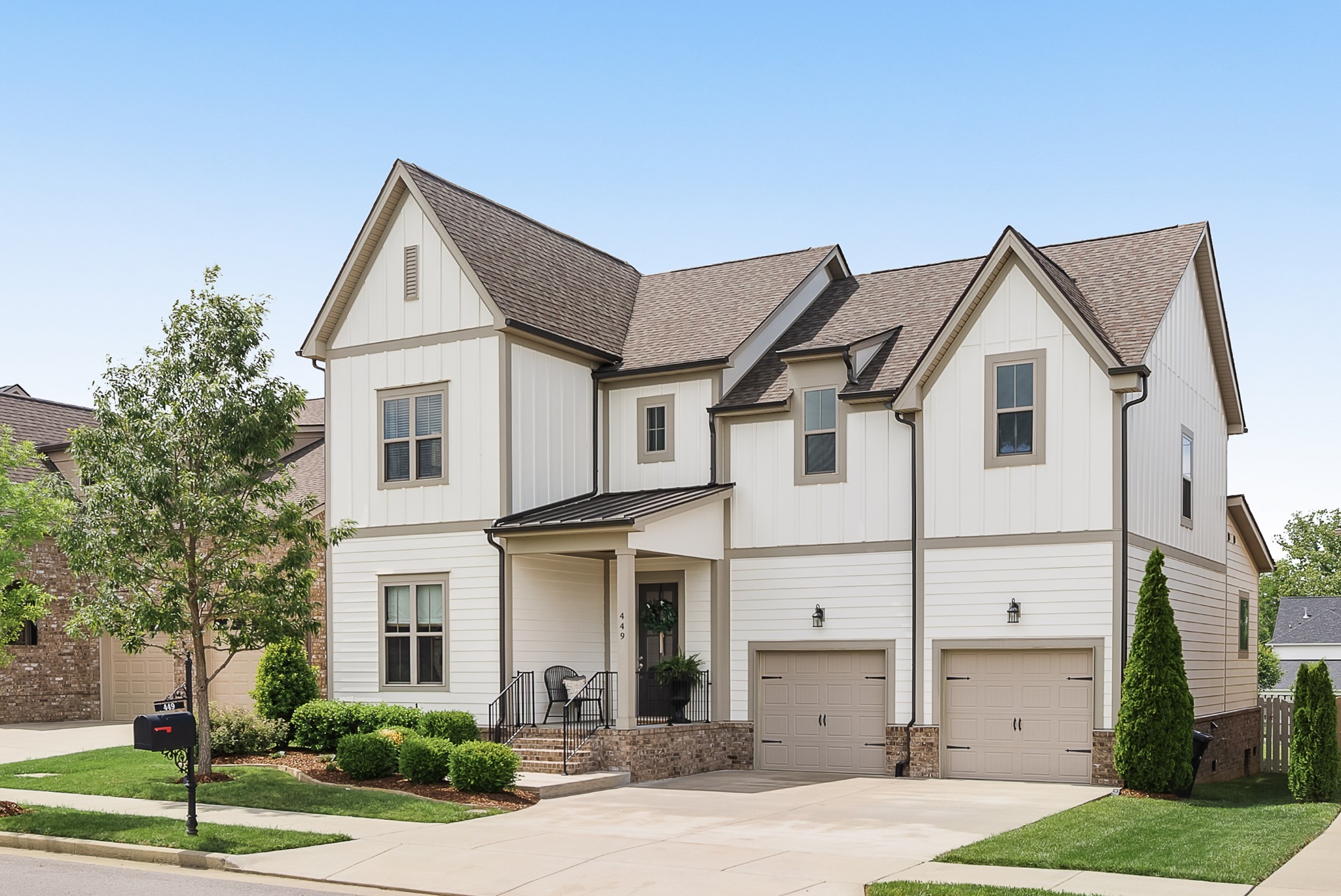 449 River Bluff Drive Franklin, TN 37064 - Photo 2 of 51 a view of a white house next to a yard
