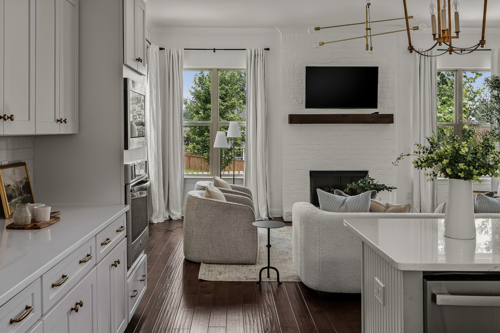 449 River Bluff Drive Franklin, TN 37064 - Photo 23 of 51 a kitchen with stainless steel appliances a microwave a stove and white cabinets