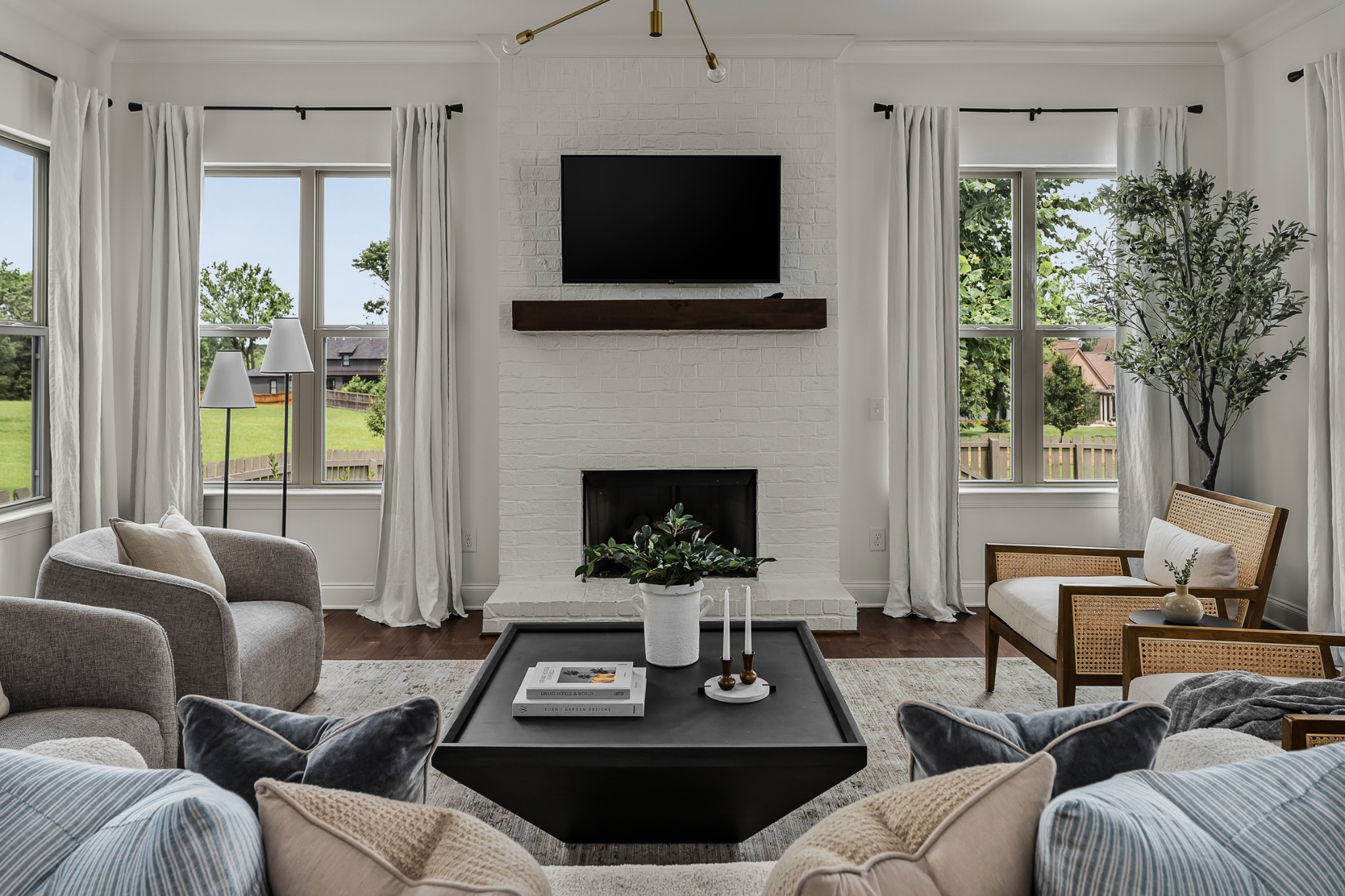 449 River Bluff Drive Franklin, TN 37064 - Photo 25 of 51 a living room with furniture a flat screen tv and a fireplace