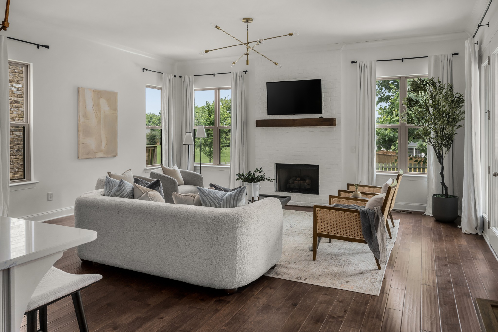 449 River Bluff Drive Franklin, TN 37064 - Photo 28 of 51 a living room with furniture a fireplace and a flat screen tv