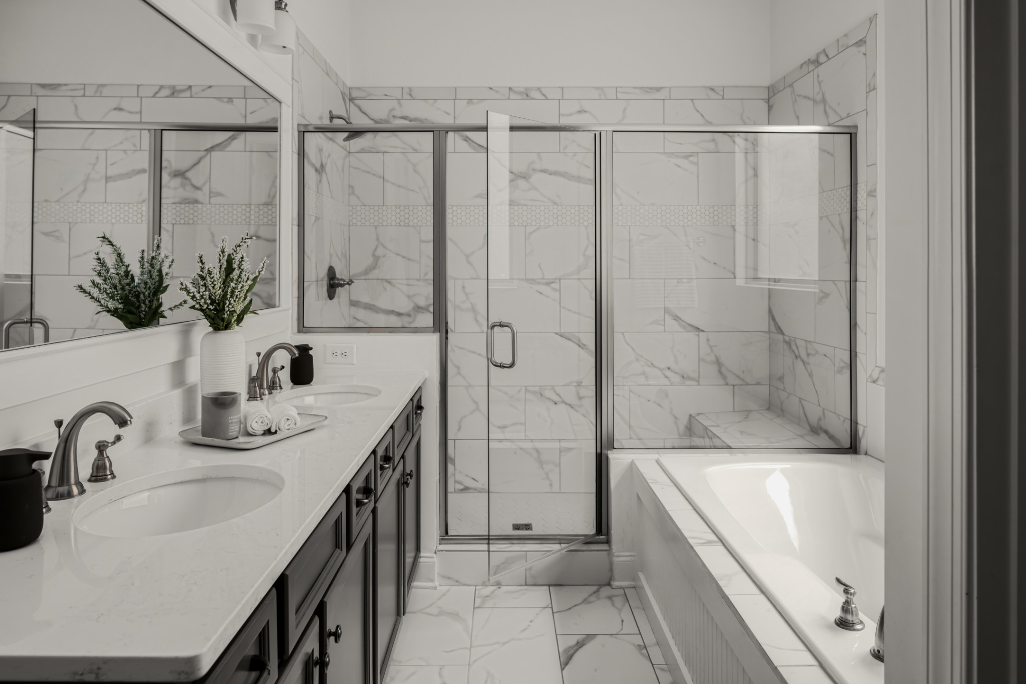 449 River Bluff Drive Franklin, TN 37064 - Photo 31 of 51 a bathroom with a granite countertop sink a mirror a bathtub and shower
