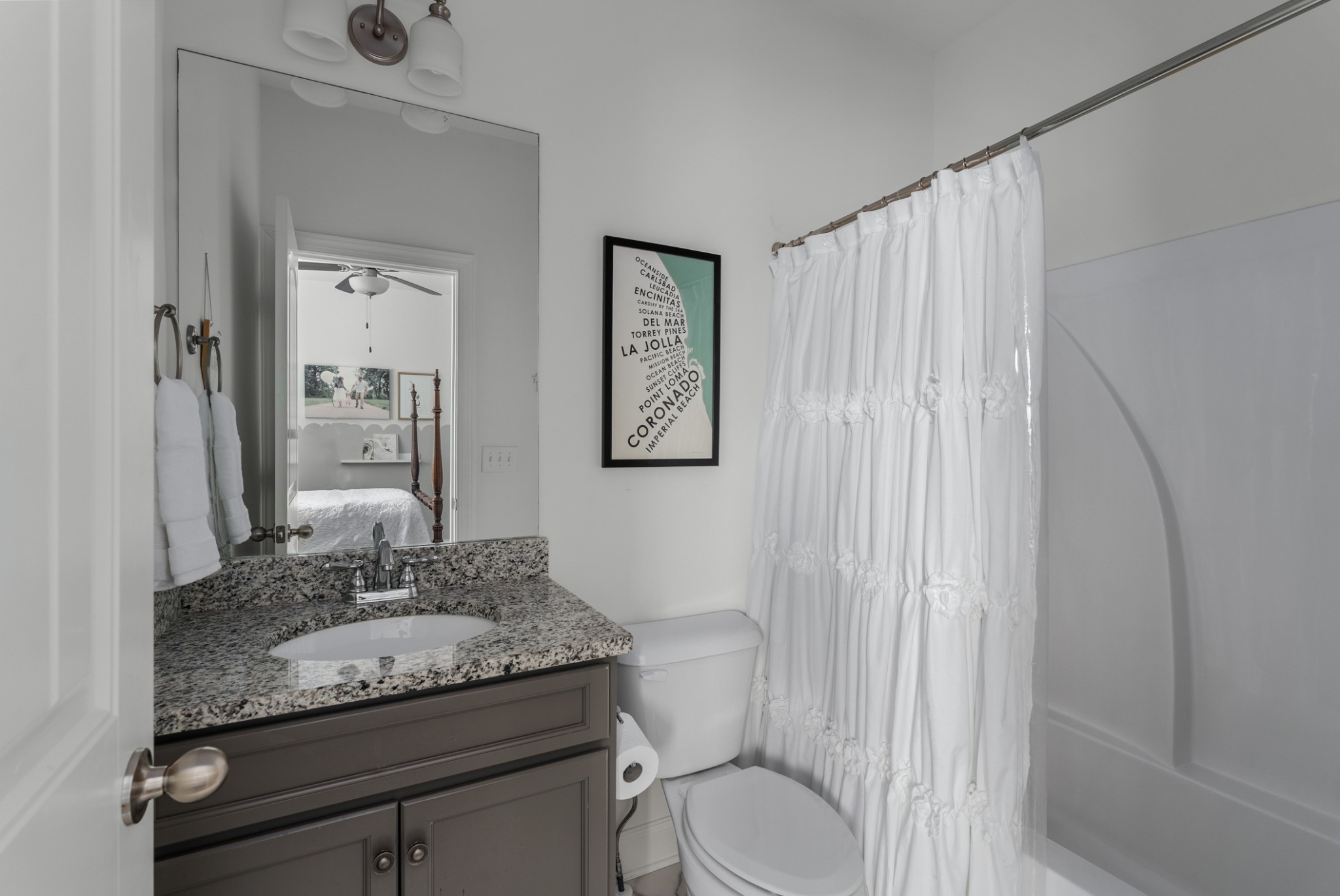 449 River Bluff Drive Franklin, TN 37064 - Photo 41 of 51 a bathroom with a granite countertop sink and a mirror with toilet