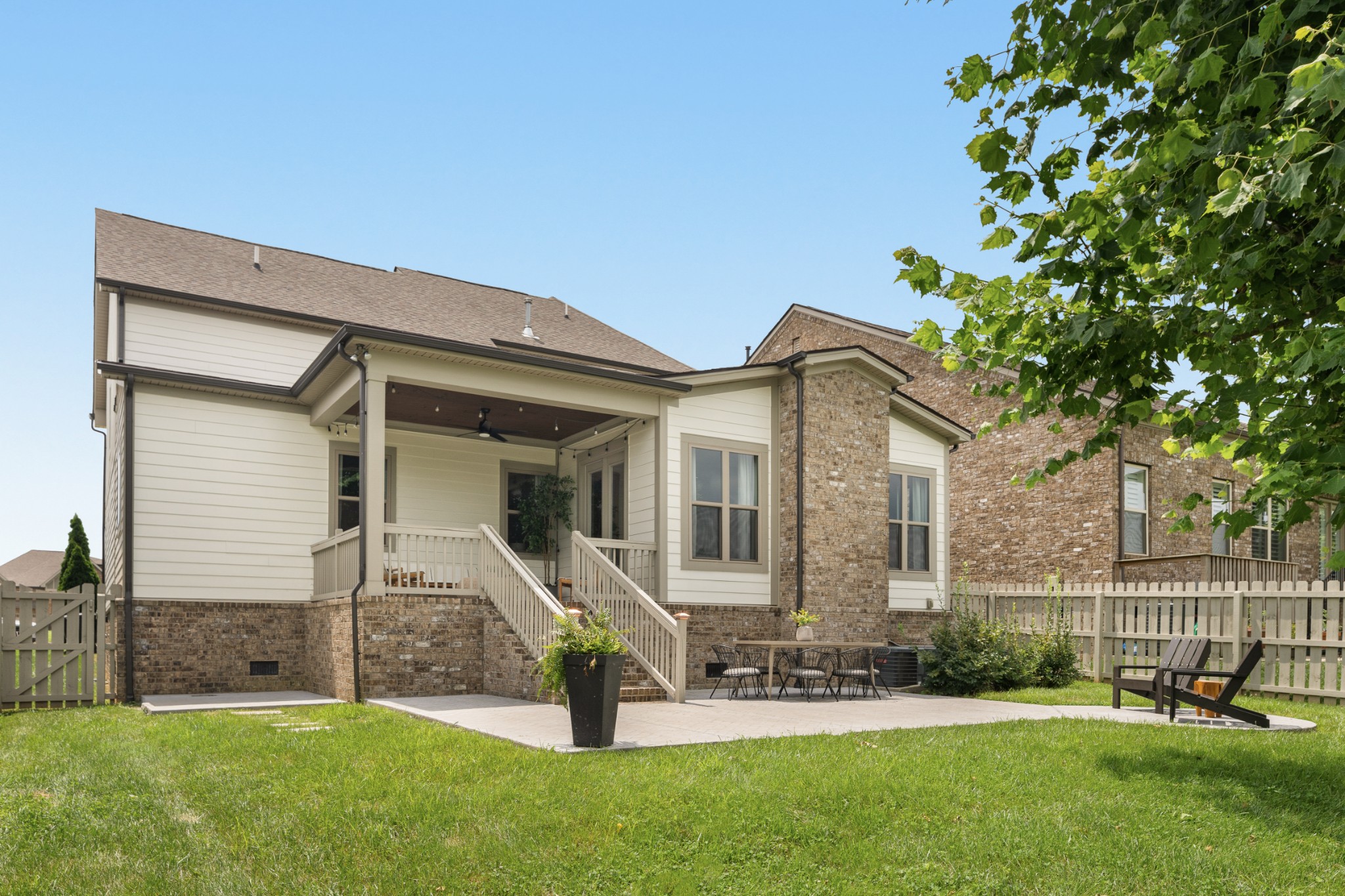 449 River Bluff Drive Franklin, TN 37064 - Photo 46 of 51 a front view of a house with a garden and yard