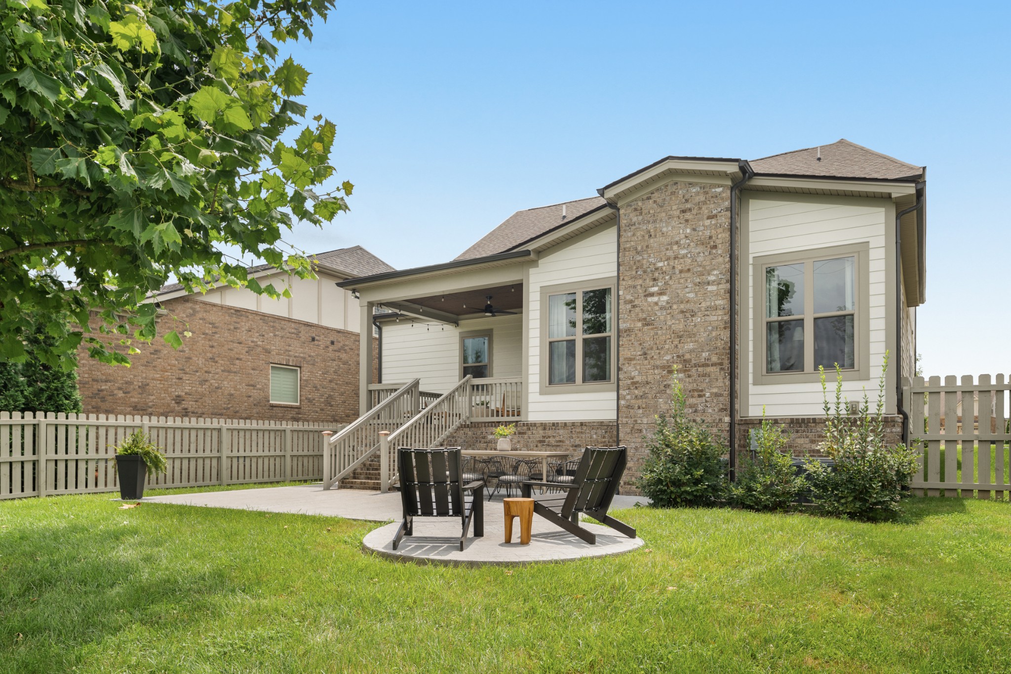 449 River Bluff Drive Franklin, TN 37064 - Photo 48 of 51 a front view of a house with a yard table and chairs