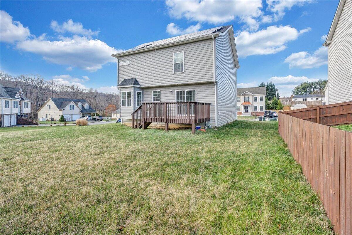 427 Cambridge Ct Road Vinton, VA 24179 - Photo 41 of 46 a view of a house with a yard and sitting area