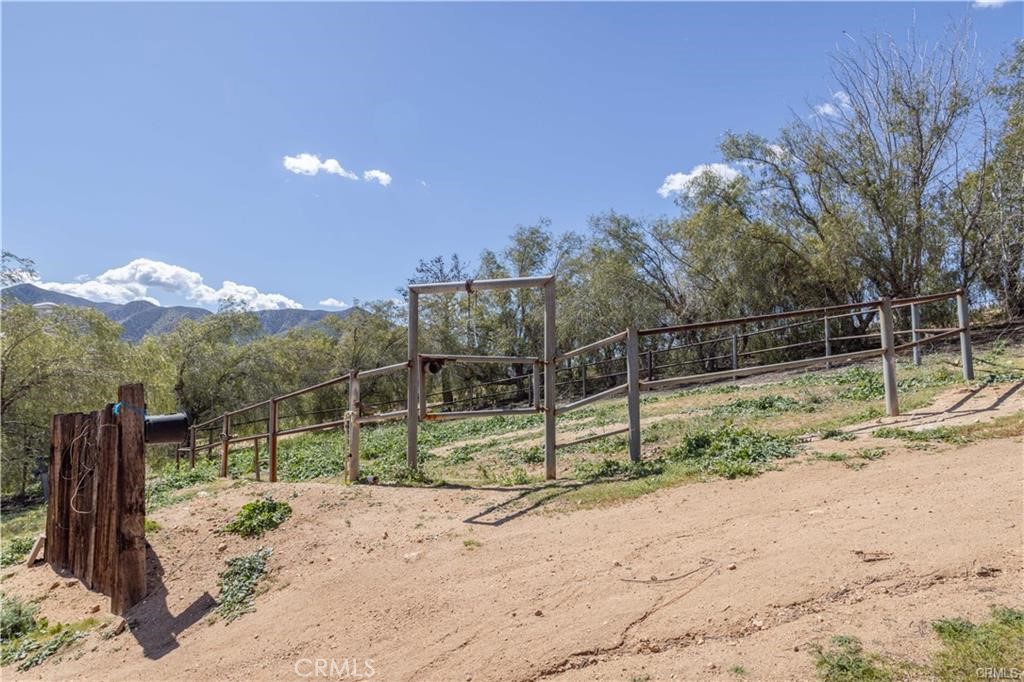 30090 Briggs Road Agua Dulce, CA 91390 - Photo 20 of 23 a view of a park with iron fence