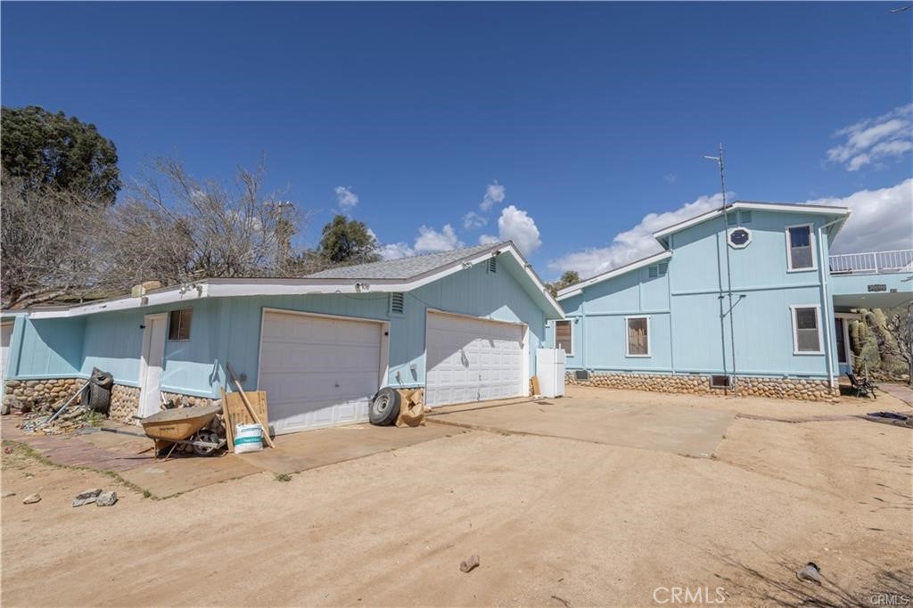 30090 Briggs Road Agua Dulce, CA 91390 - Photo 21 of 23 a view of a house with a patio