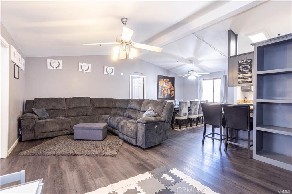 30090 Briggs Road Agua Dulce, CA 91390 - Photo 6 of 23 a living room with furniture wooden floor and a chandelier
