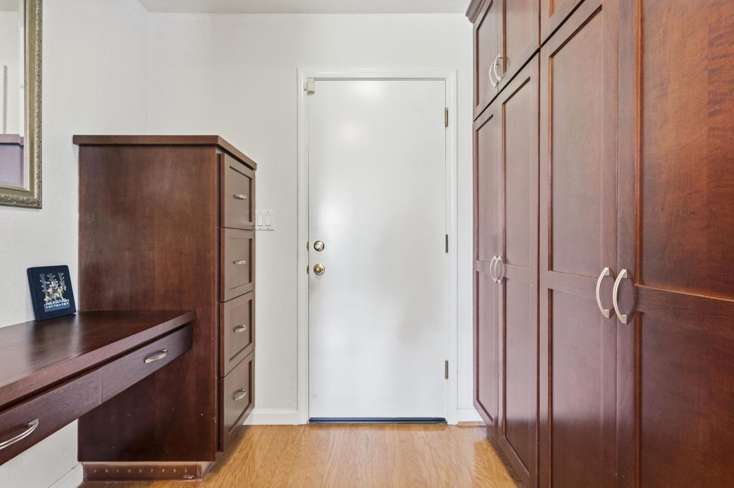 35 Sierra Ridge Court Danville, CA 94506 - Photo 19 of 37 a view of a hallway with wooden floor