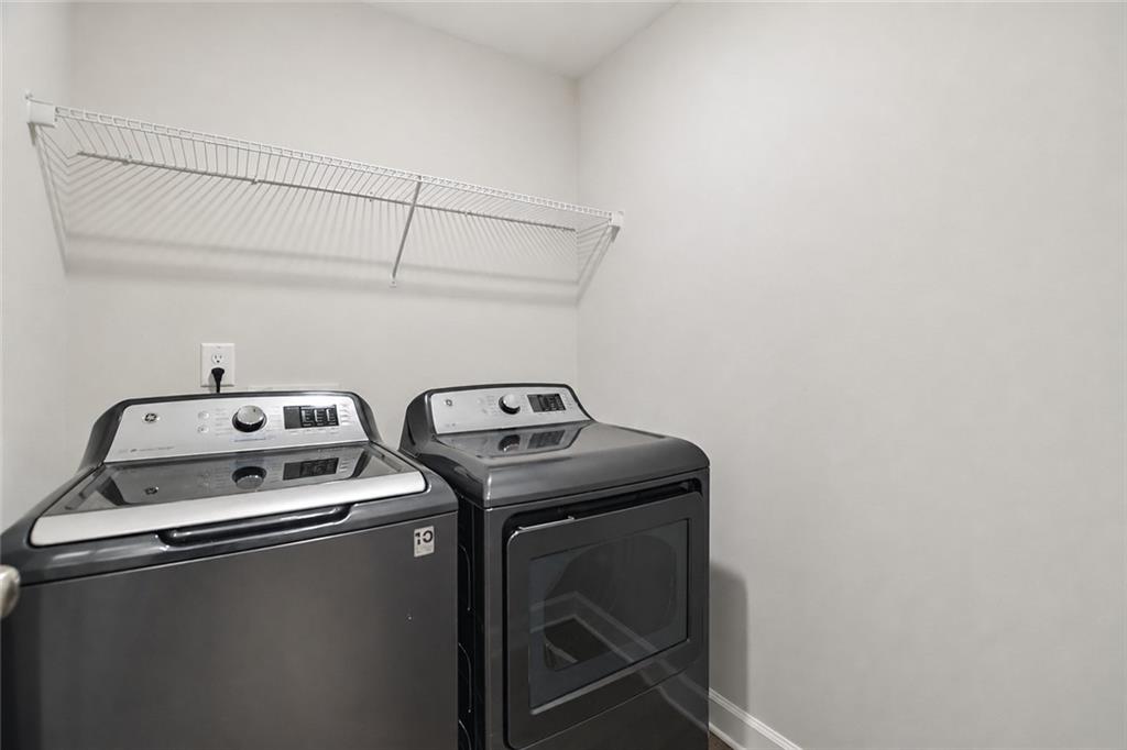 765 Trevett Way Marietta, GA 30066 - Photo 30 of 44 a utility room with dryer and washer
