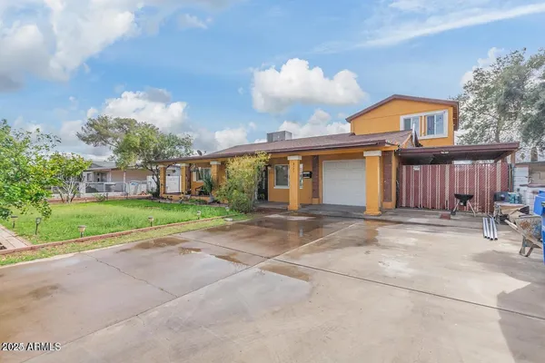 a view of a house with a patio
