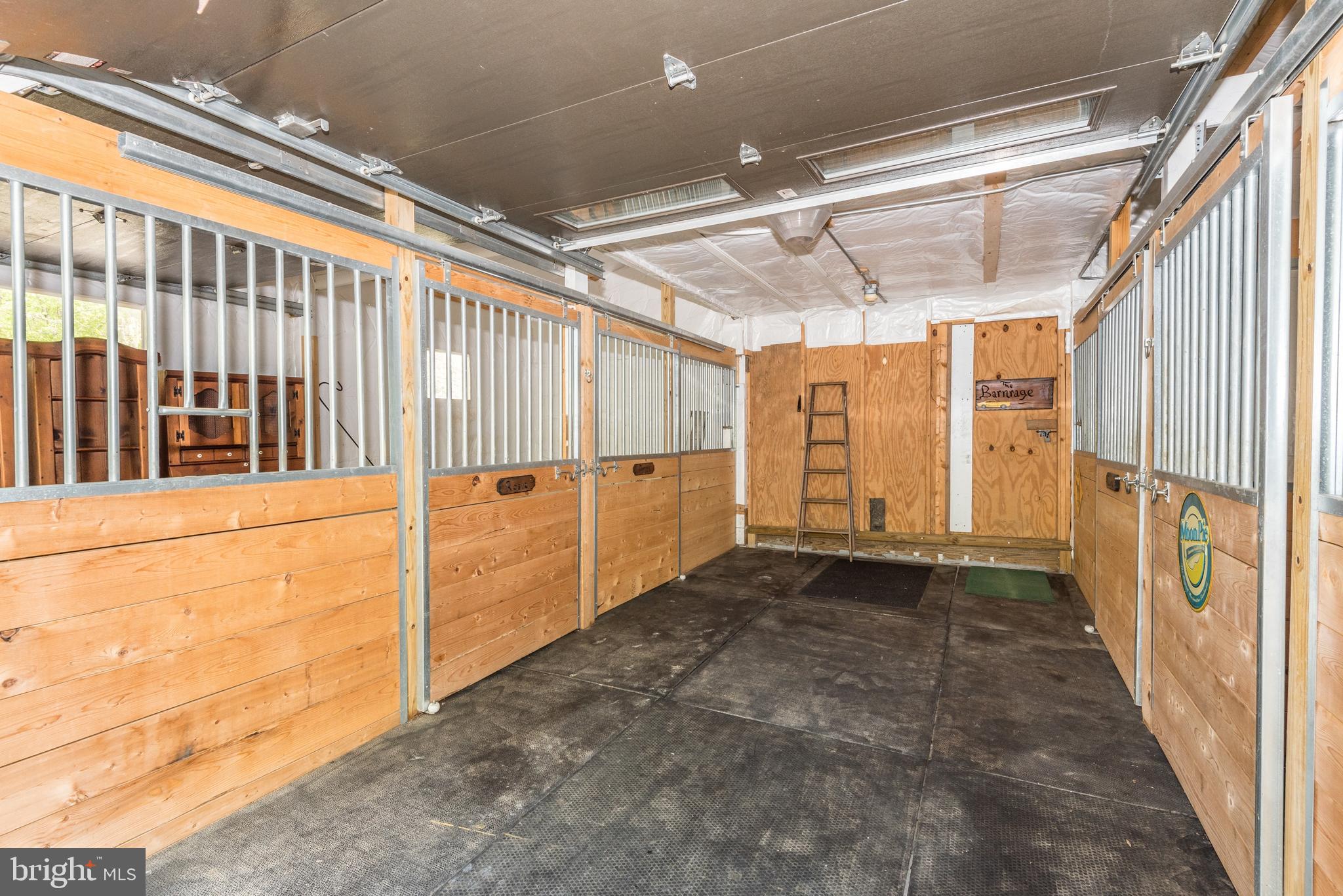 18131 New Cut Road Mount Airy, MD 21771 - Photo 45 of 69 Isle and stalls all have mats