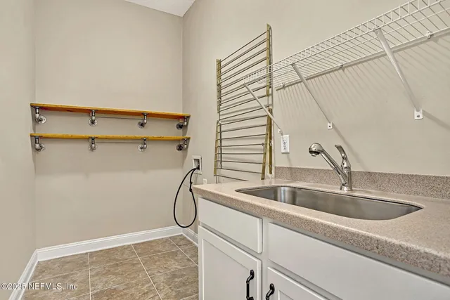 a bathroom with a sink and a shower