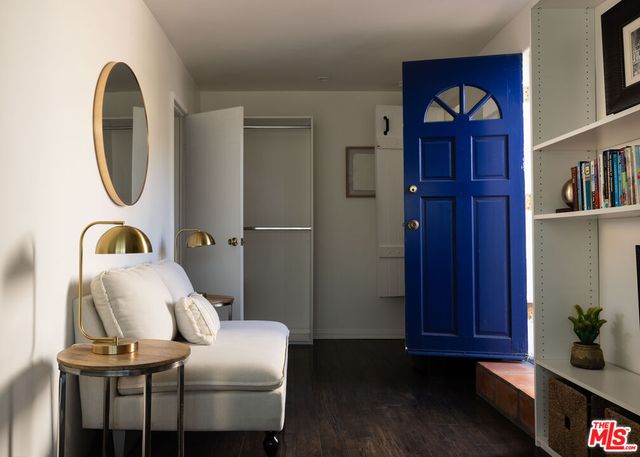 a room with furniture and wooden floor