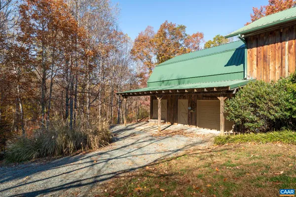 a view of balcony with furniture and wooden floor