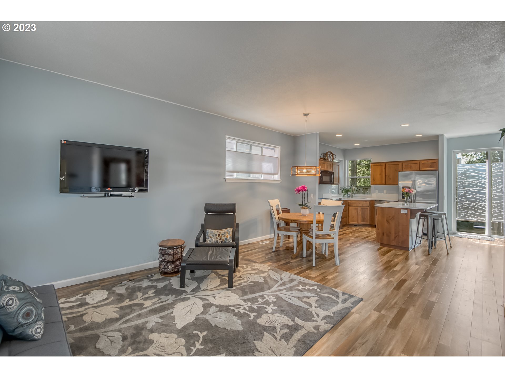 18074 Southwest Lotus Lane Beaverton, OR 97003 - Photo 4 of 19 a living room with furniture and a table